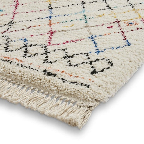 Bohemian multi coloured rug with tassels close up